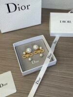 mental Pearl and bow earrings - 图片 3