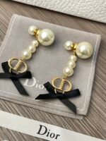 Pearl and bow earrings - 图片 9